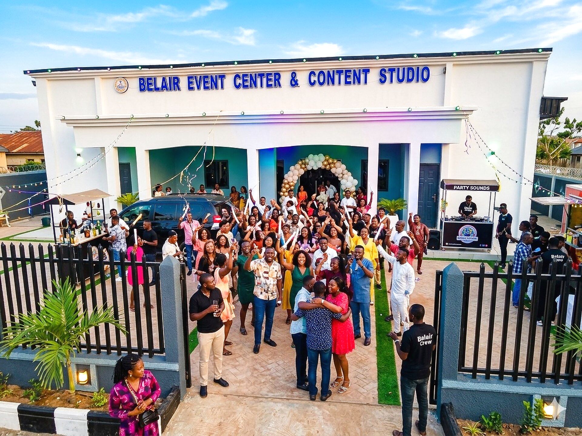 Guests celebrating in front of Belair